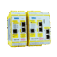 plc safety scu-1-ec/x Due moduli di controllo industriale gialli con etichette e connessioni per sistemi di automazione.